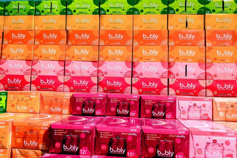 Colorful Stacks Of Bubly Sparkling Water On A Grocery Store Aisle