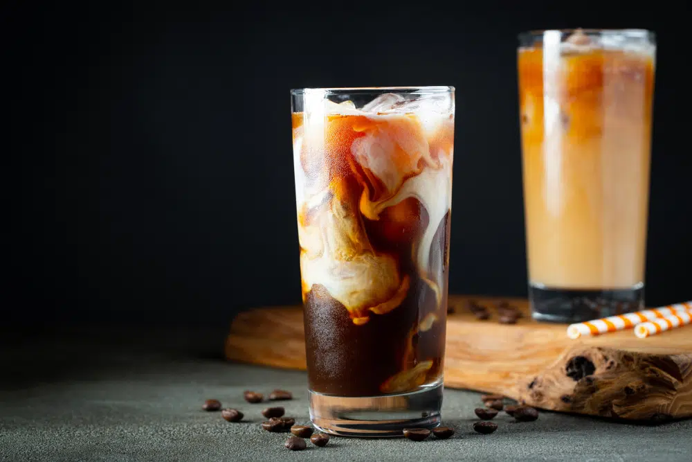 Two Tall Glasses Of Cold Brew Coffee On Top Of A Table