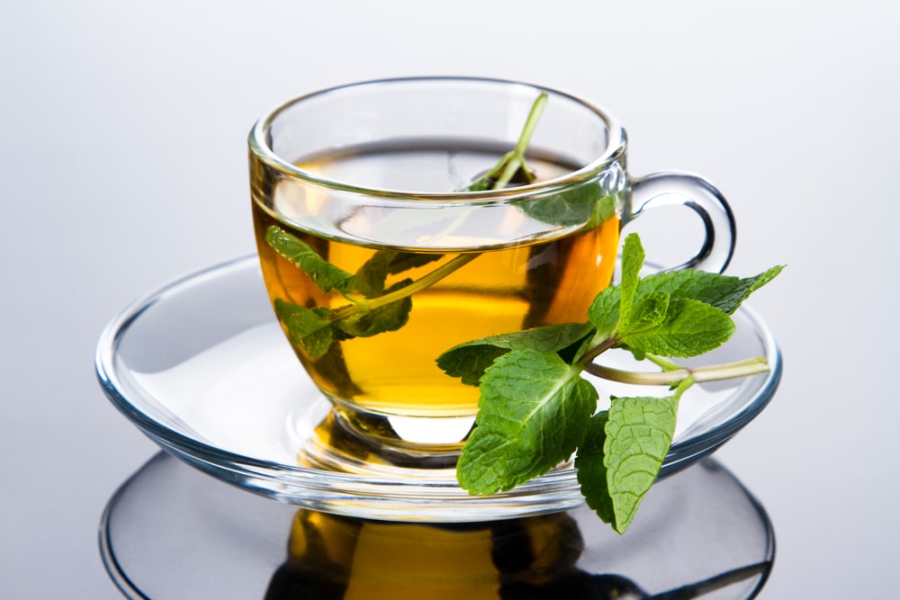 Close Up Photo Of Peppermint Tea With Fresh Peppermint Leaves