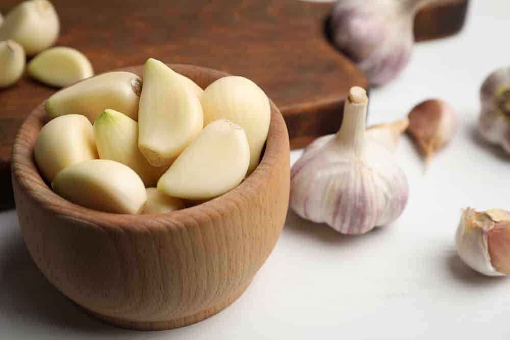 Close Up Of Fresh Organic Peeled Garlic On A Bowl