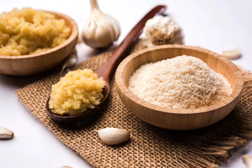 Garlic Clove, Powder And Paste On The Table