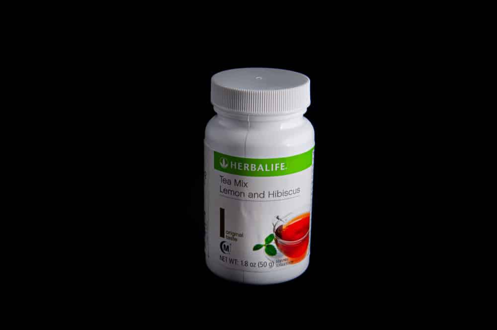 Herbalife's Tea Mix With Hibiscus  Product On A Black Background