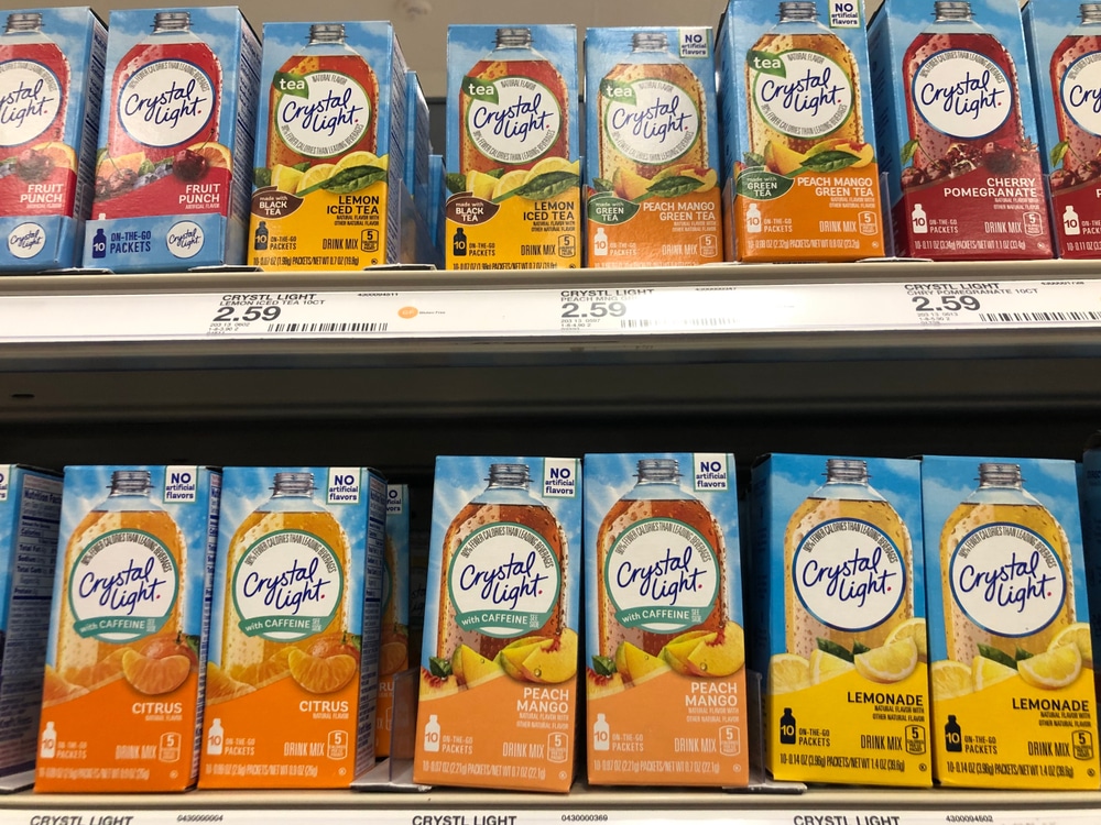 Display Of A Variety Of Crystal Light Drink Mix On A Grocery Aisle